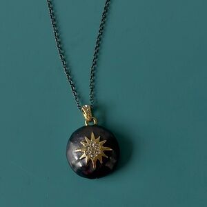 Elegant Charcoal and Gold Sunburst Pendant Necklace